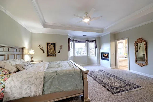 a bathroom with a tub a sink and a shower