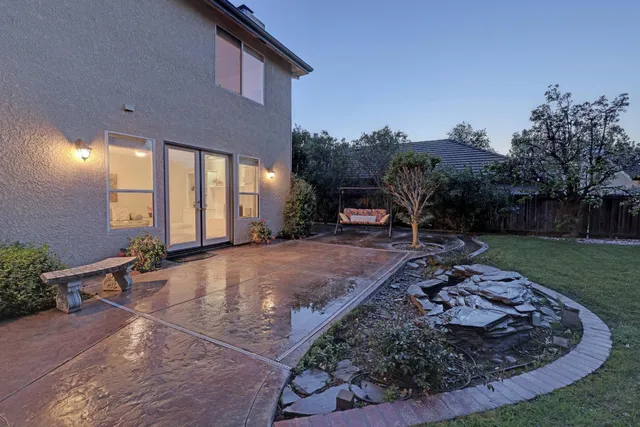 a view of a garden with a slide