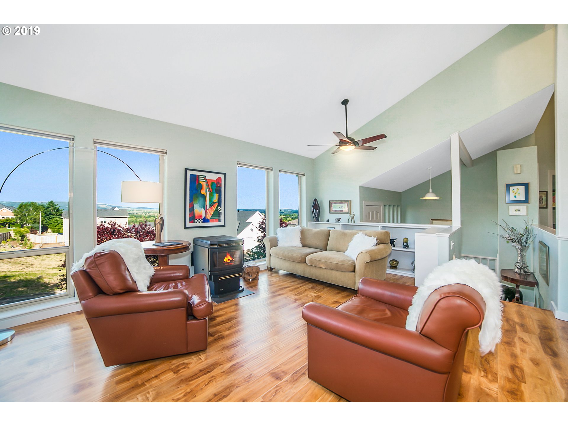 1119 Southwest 1st Street Dundee, OR 97115 - Photo 11 of 32 a living room with furniture and a large window