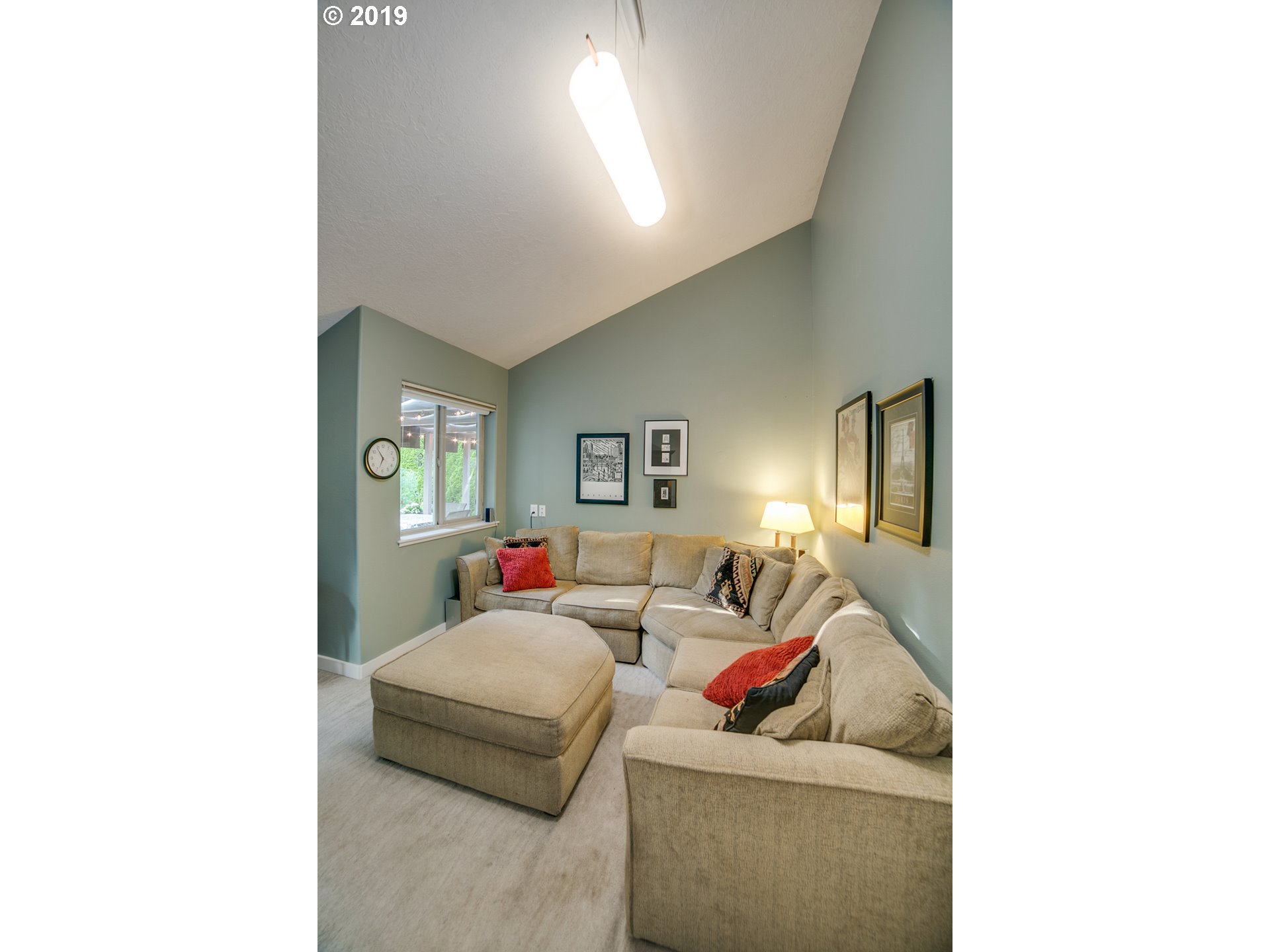 1119 Southwest 1st Street Dundee, OR 97115 - Photo 17 of 32 a living room with furniture and a window