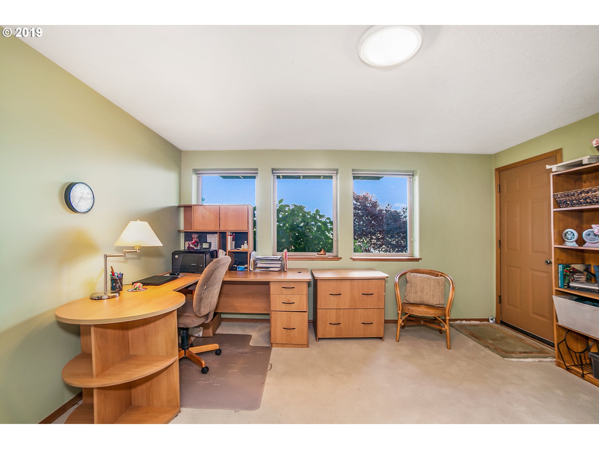 1119 Southwest 1st Street Dundee, OR 97115 - Photo 24 of 32 a living room with furniture a window and a table