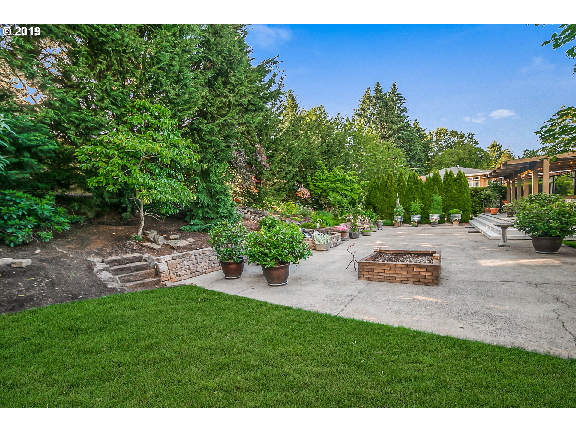1119 Southwest 1st Street Dundee, OR 97115 - Photo 28 of 32 a view of a backyard with a garden