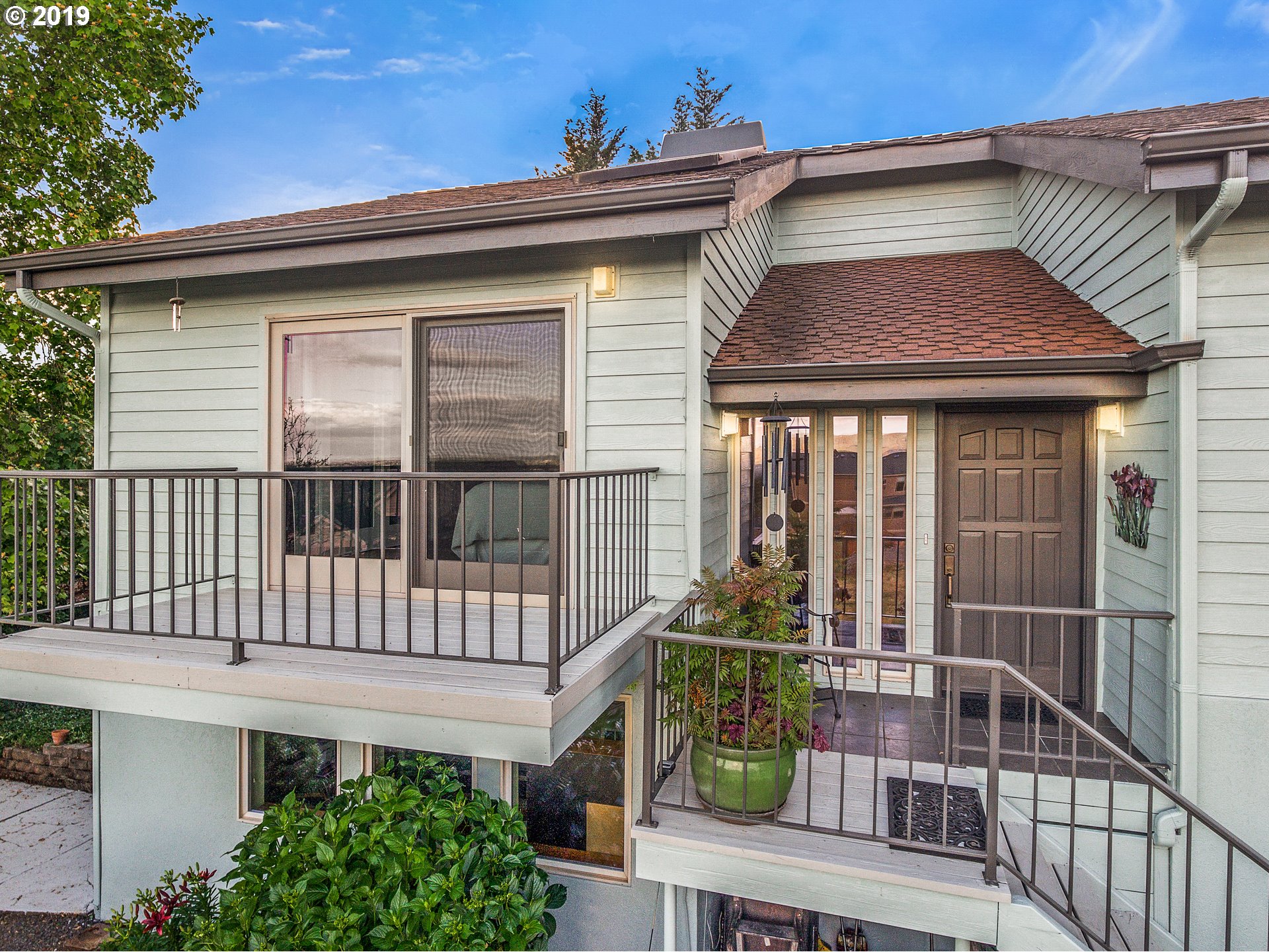 1119 Southwest 1st Street Dundee, OR 97115 - Photo 8 of 32 a view of a chair and table in the balcony