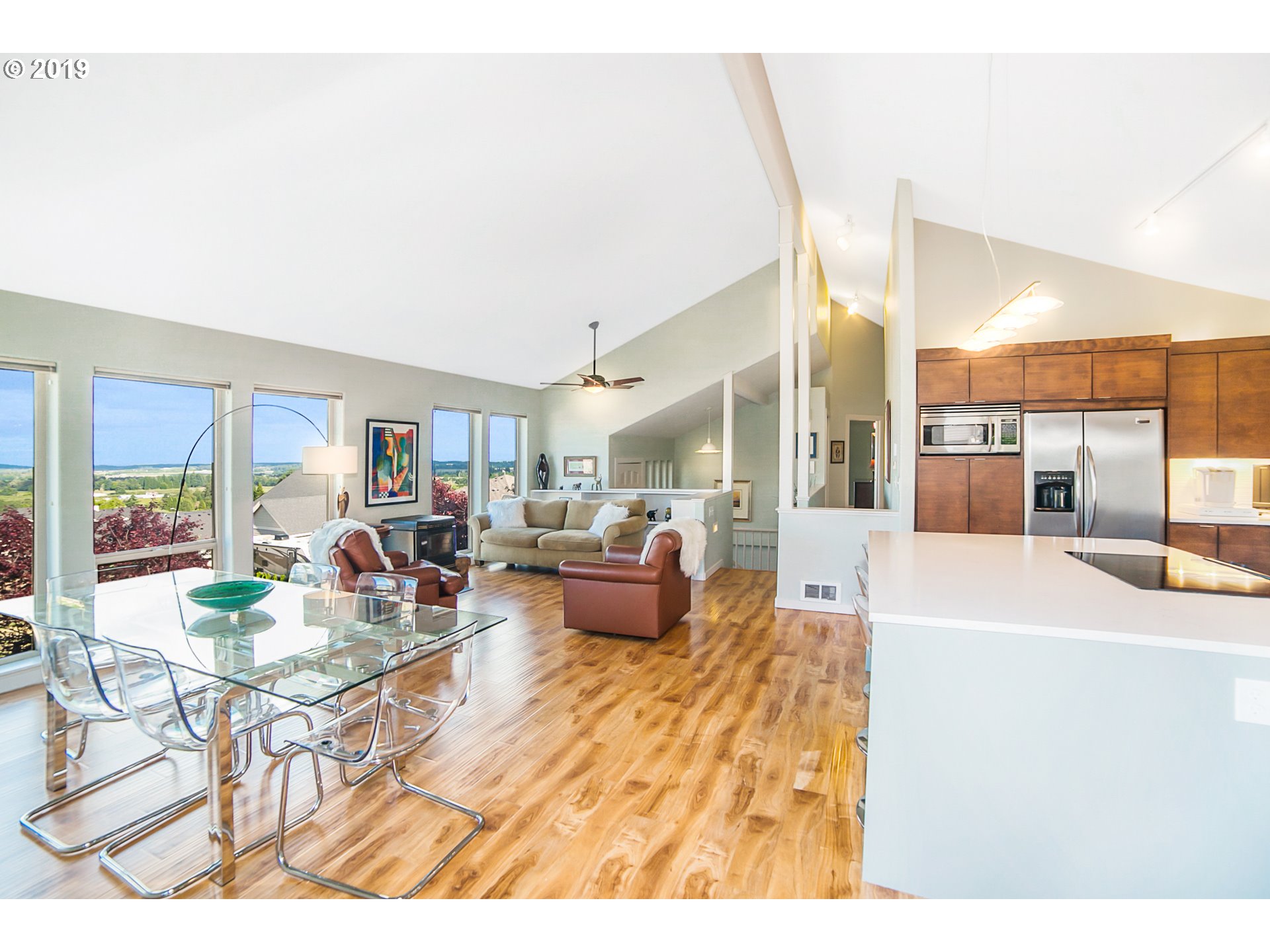 1119 Southwest 1st Street Dundee, OR 97115 - Photo 10 of 32 a living room with furniture and a wooden floor
