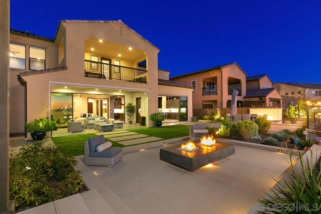 16438 Nicole Ridge Road San Diego, CA 92127 - Photo 1 of 25 a front view of a house with swimming pool having outdoor seating