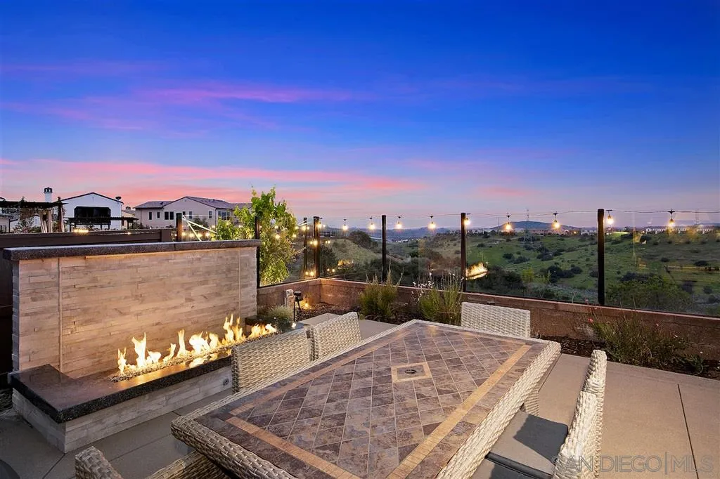 16438 Nicole Ridge Road San Diego, CA 92127 - Photo 21 of 25 a view of a terrace with a bench