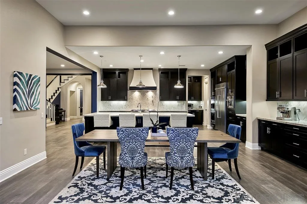 16438 Nicole Ridge Road San Diego, CA 92127 - Photo 5 of 25 a view of a dining room with furniture