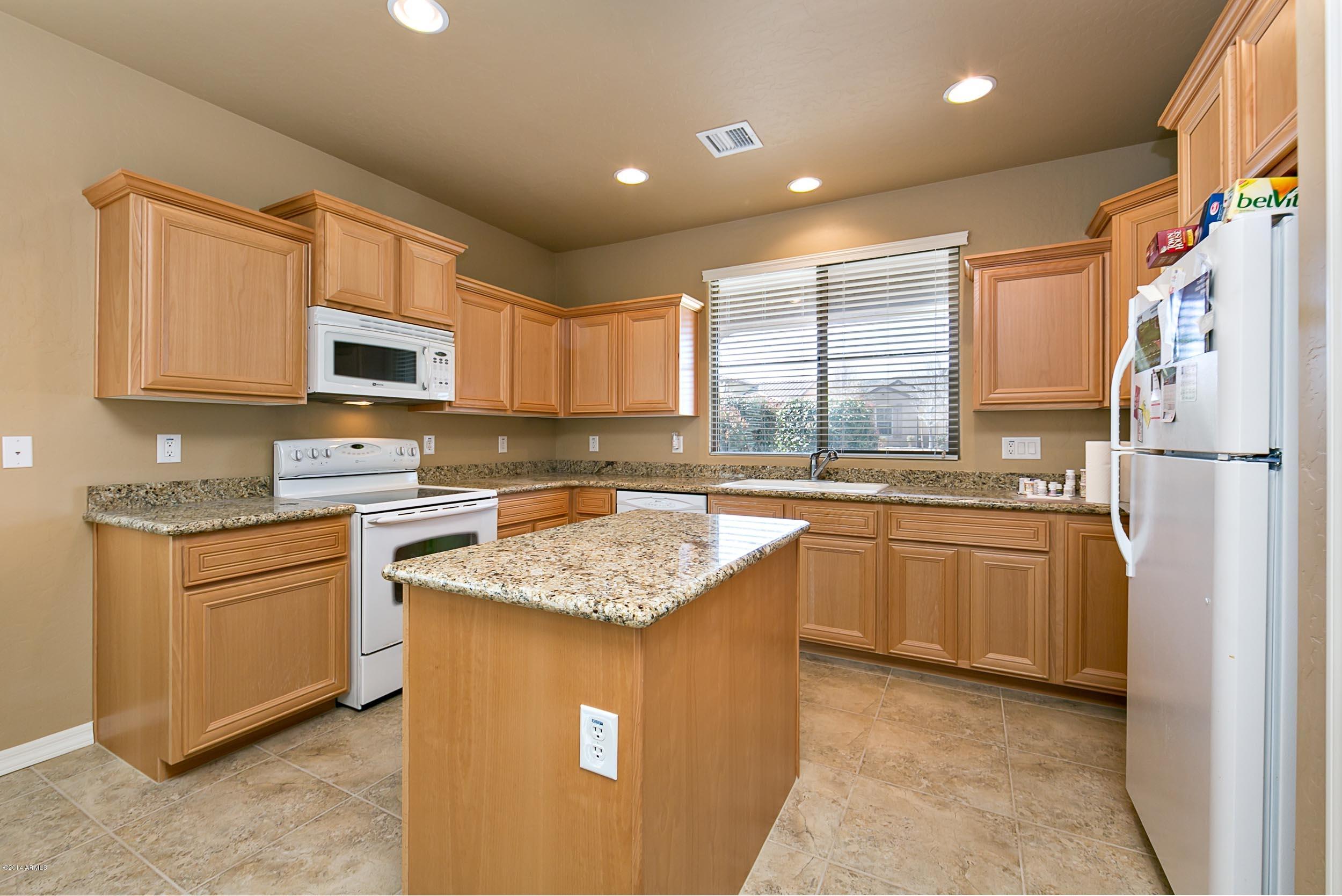 1143 Rigo Ranch Road Prescott Valley, AZ 86314 - Photo 3 of 22 Granite Kitchen with Island