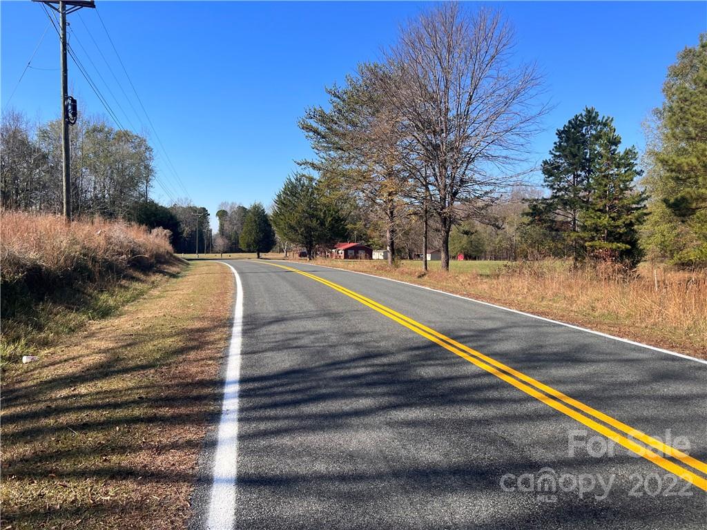 2995 McCaw Road Sharon, SC 29742 - Photo 8 of 9 a view of a tennis ground with large trees