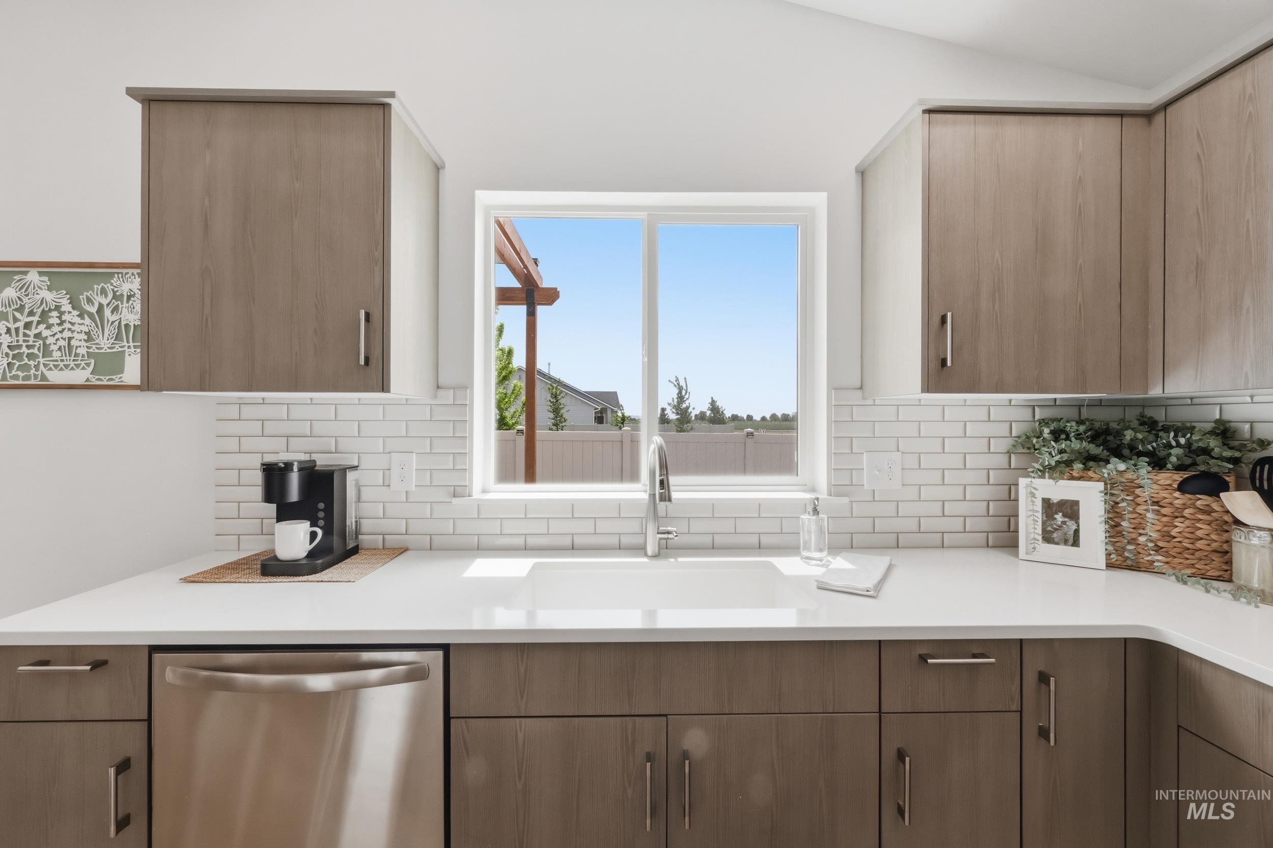 3665 W Lane Meridian, ID 83642 - Photo 9 of 42 Open-concept living space featuring vaulted ceilings and recessed lighting