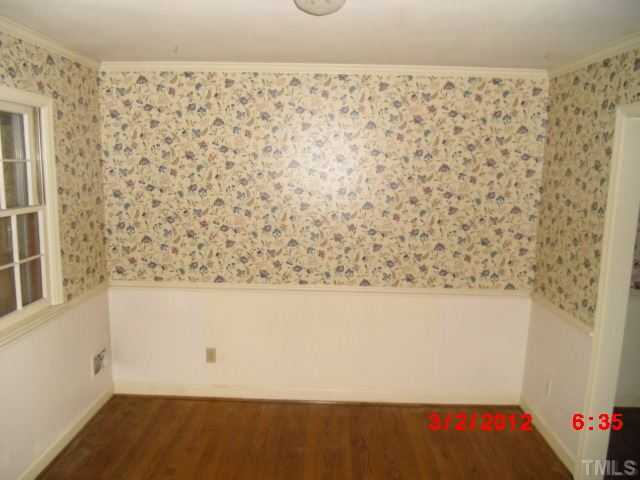 5005 Oak Park Road Raleigh, NC 27612 - Photo 3 of 9 a view of wooden floor