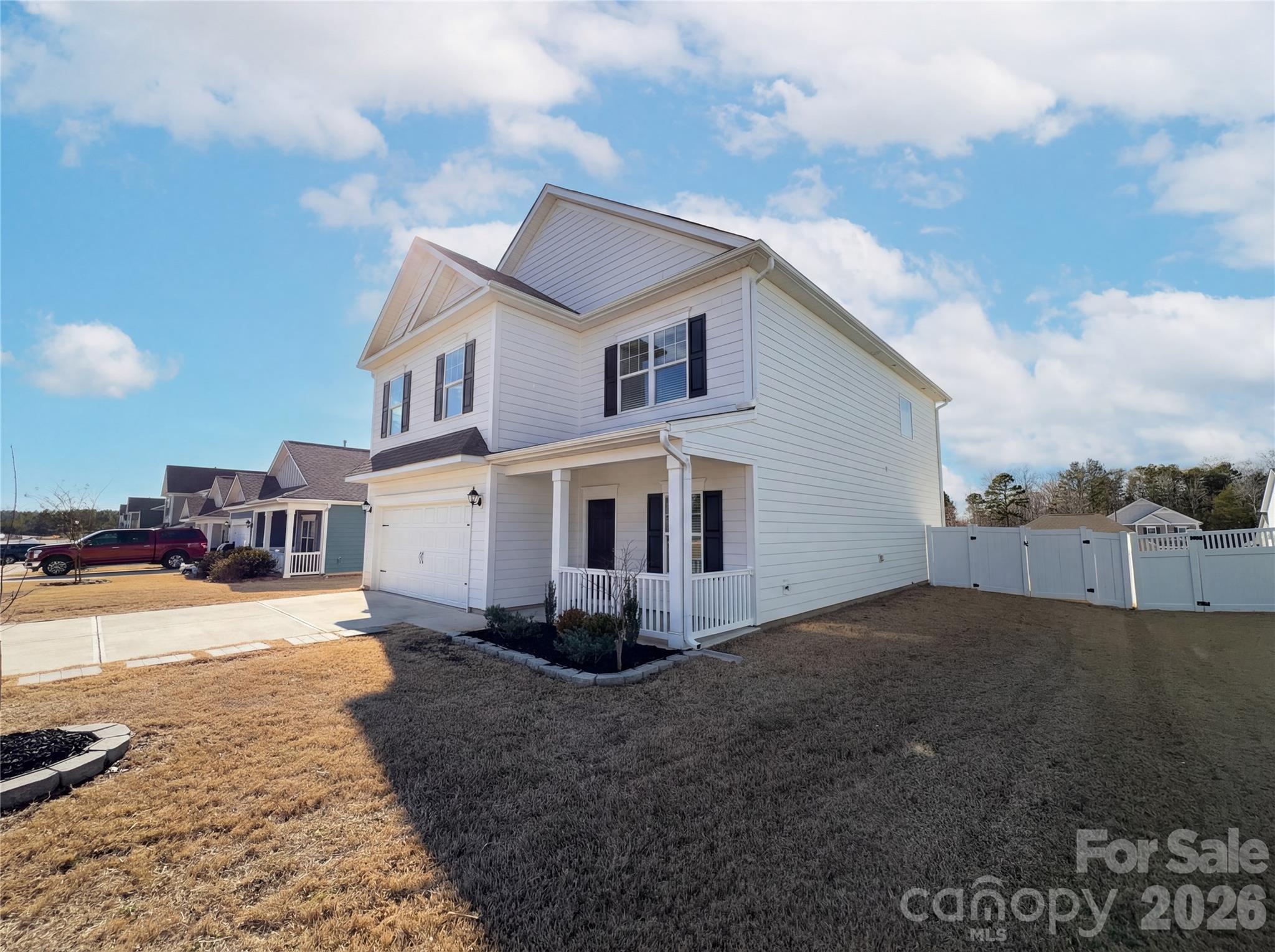 617 Ardsley Drive Locust, NC 28097 - Photo 21 of 23 a view of a house with a yard