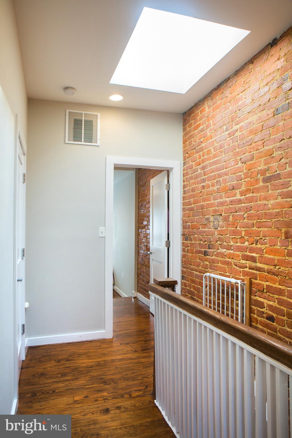 307 E Street Northeast Washington, DC 20002 - Photo 18 of 29 Skylight, Exposed Brick Linen Closet