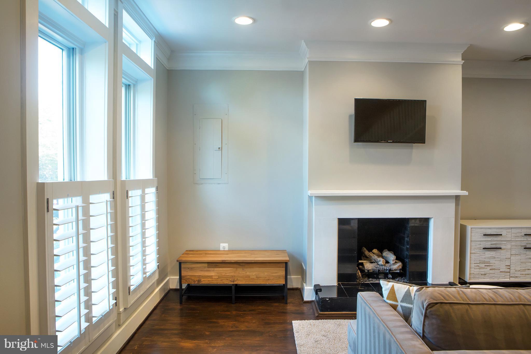 307 E Street Northeast Washington, DC 20002 - Photo 6 of 29 Fireplace and Brand New Windows!