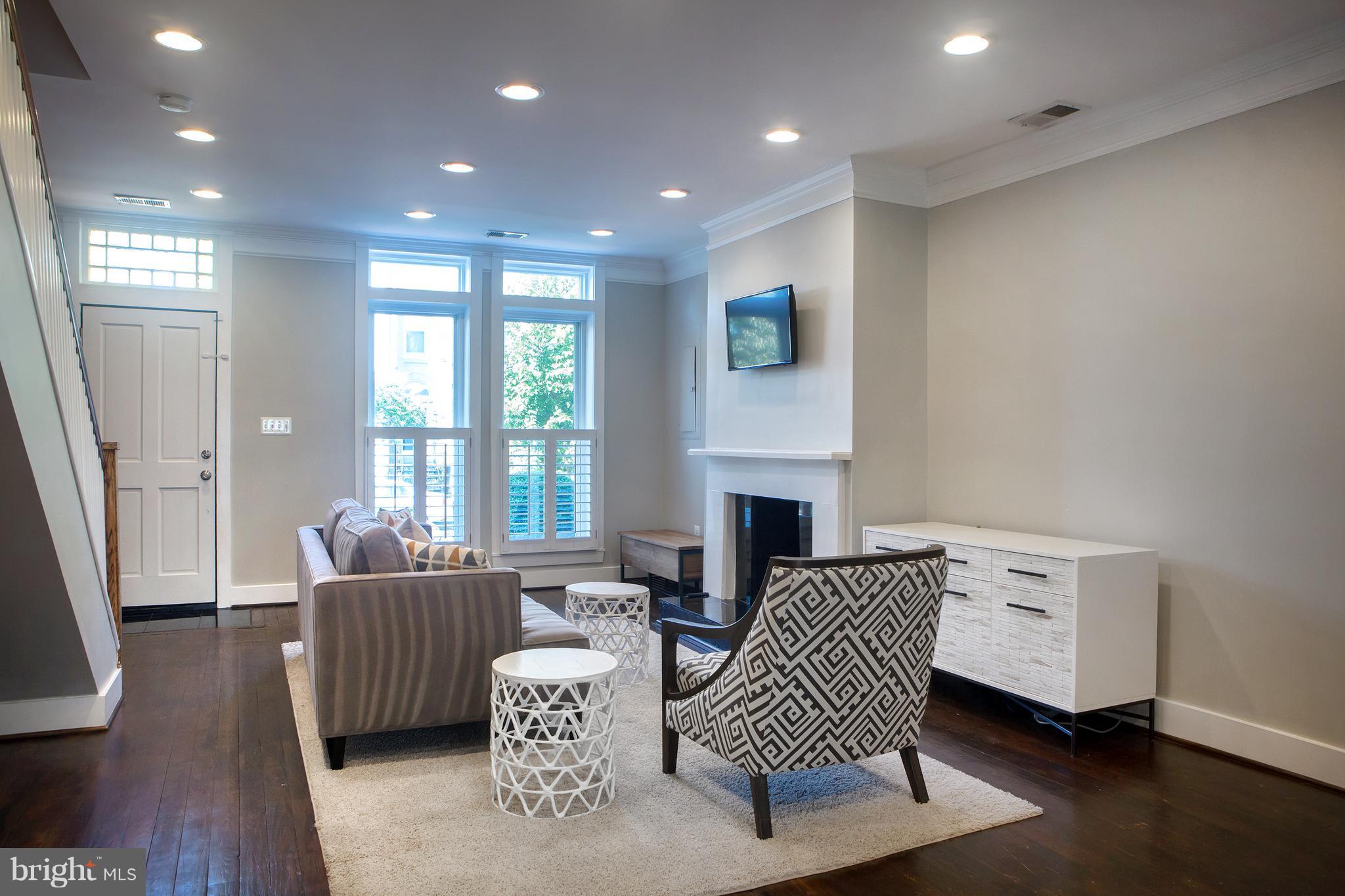 307 E Street Northeast Washington, DC 20002 - Photo 7 of 29 Open Layout Living Room with Fireplace
