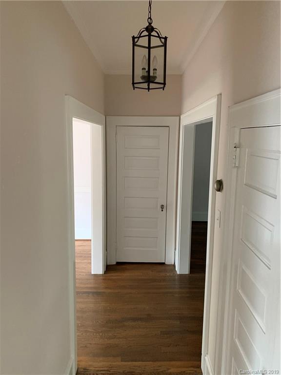 224 Providence Road Charlotte, NC 28207 - Photo 19 of 27 a view of a hallway with wooden floor