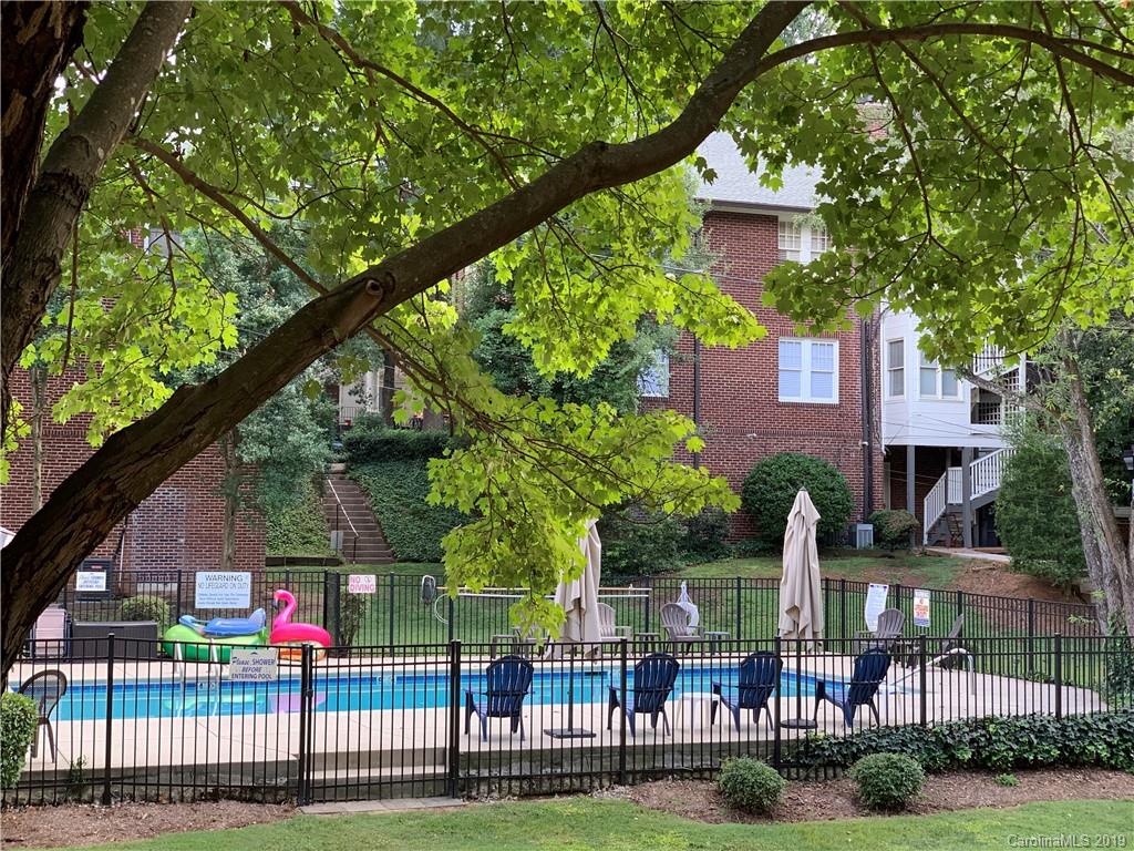 224 Providence Road Charlotte, NC 28207 - Photo 25 of 27 a front view of a house with a garden