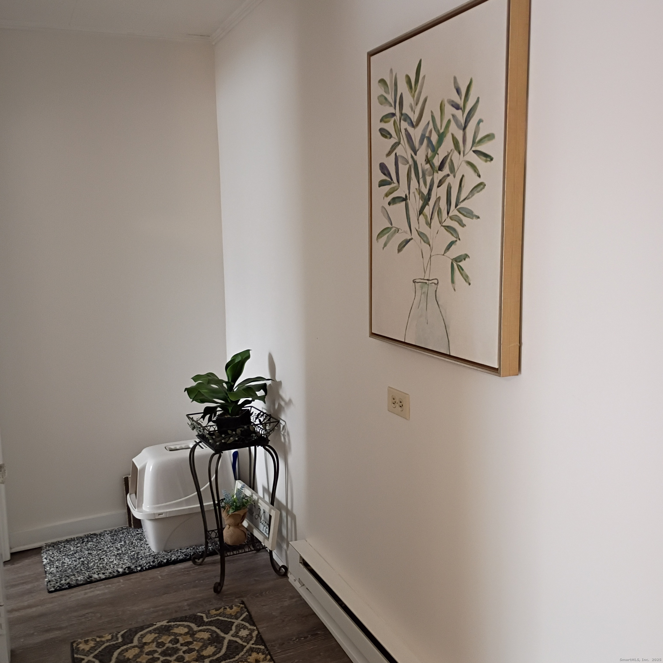 59 View Street, Unit 2 Bristol, CT 06010 - Photo 12 of 37 a table with a vase and flowers on it