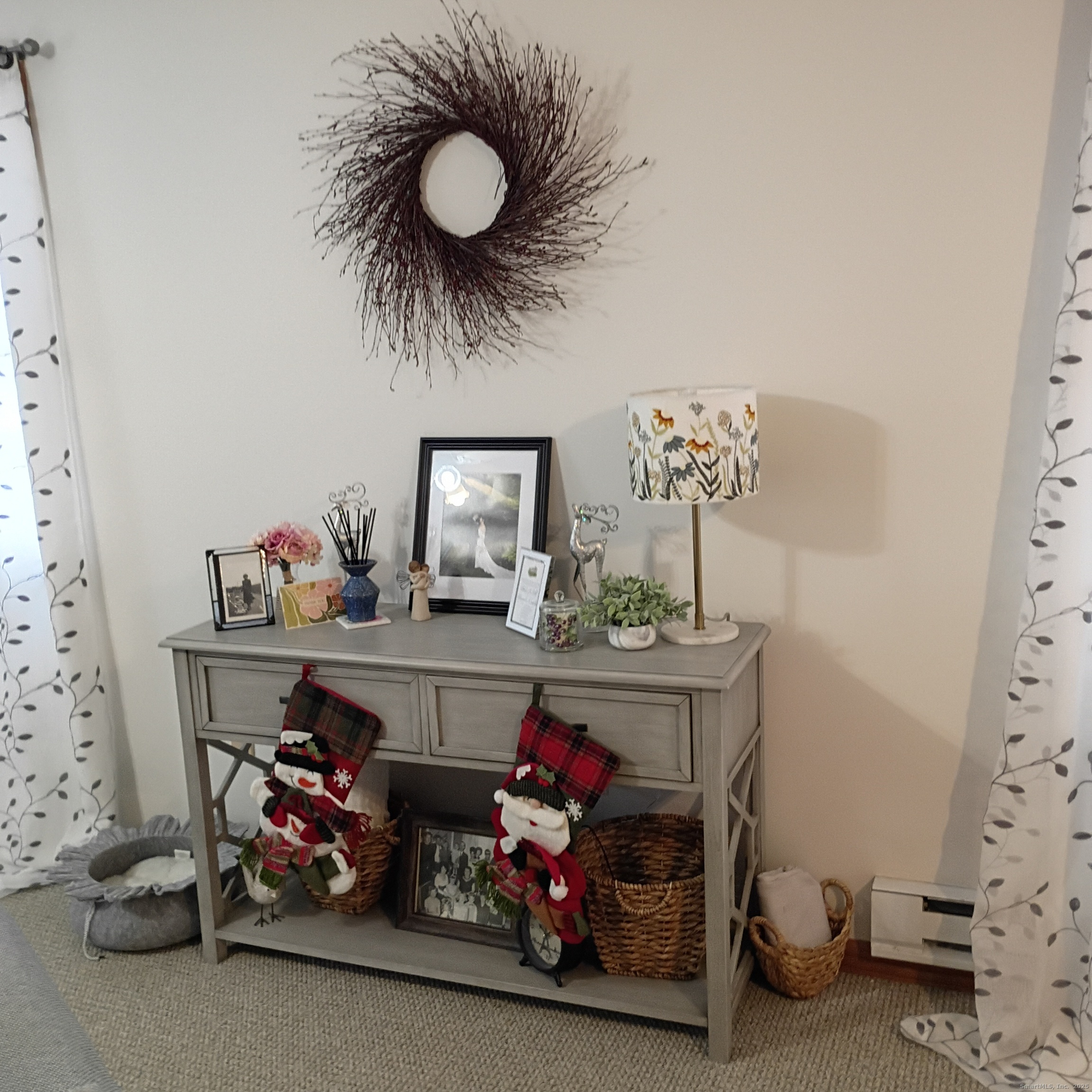 59 View Street, Unit 2 Bristol, CT 06010 - Photo 15 of 37 a living room with furniture and a chandelier