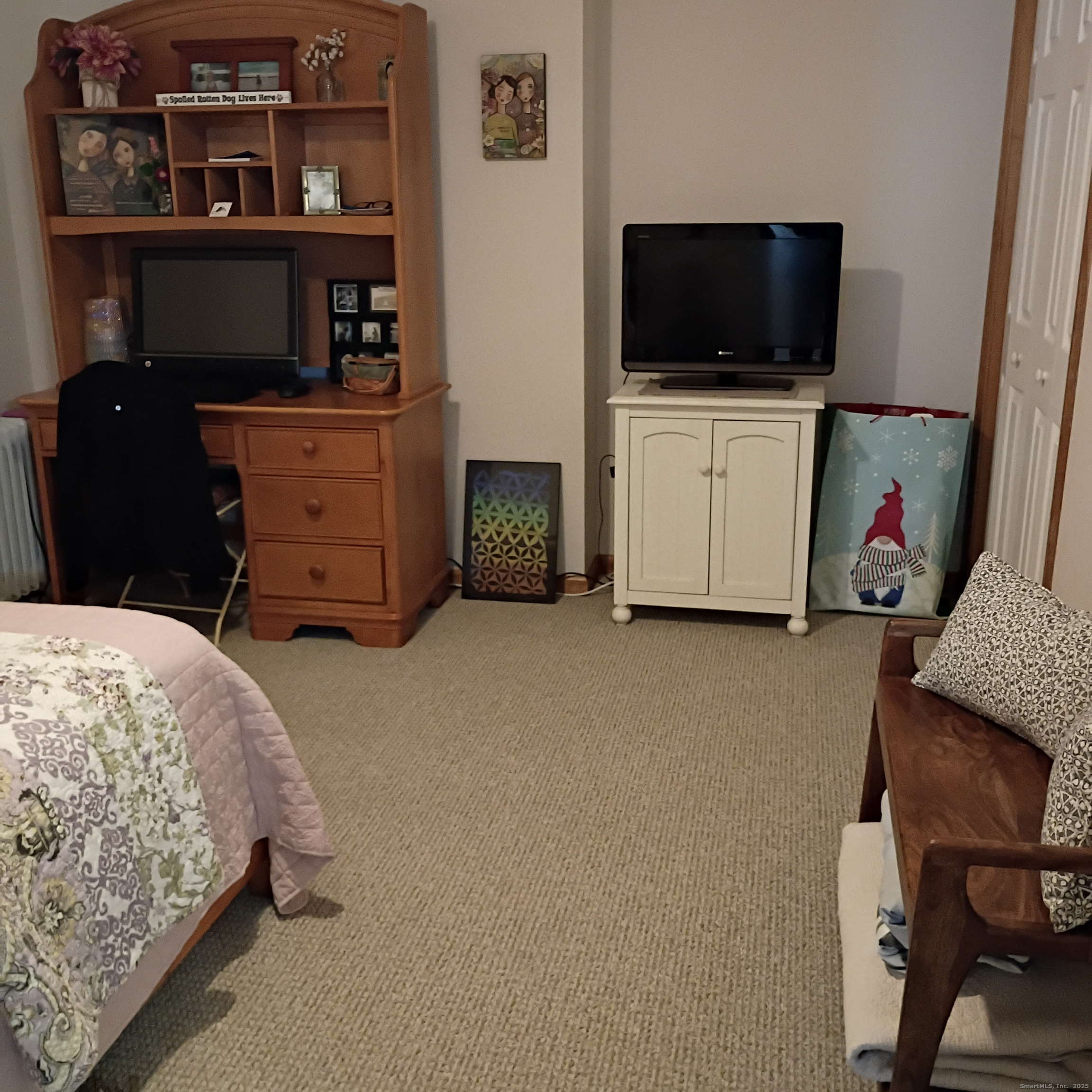 59 View Street, Unit 2 Bristol, CT 06010 - Photo 25 of 37 a bedroom with a bed and flat screen tv