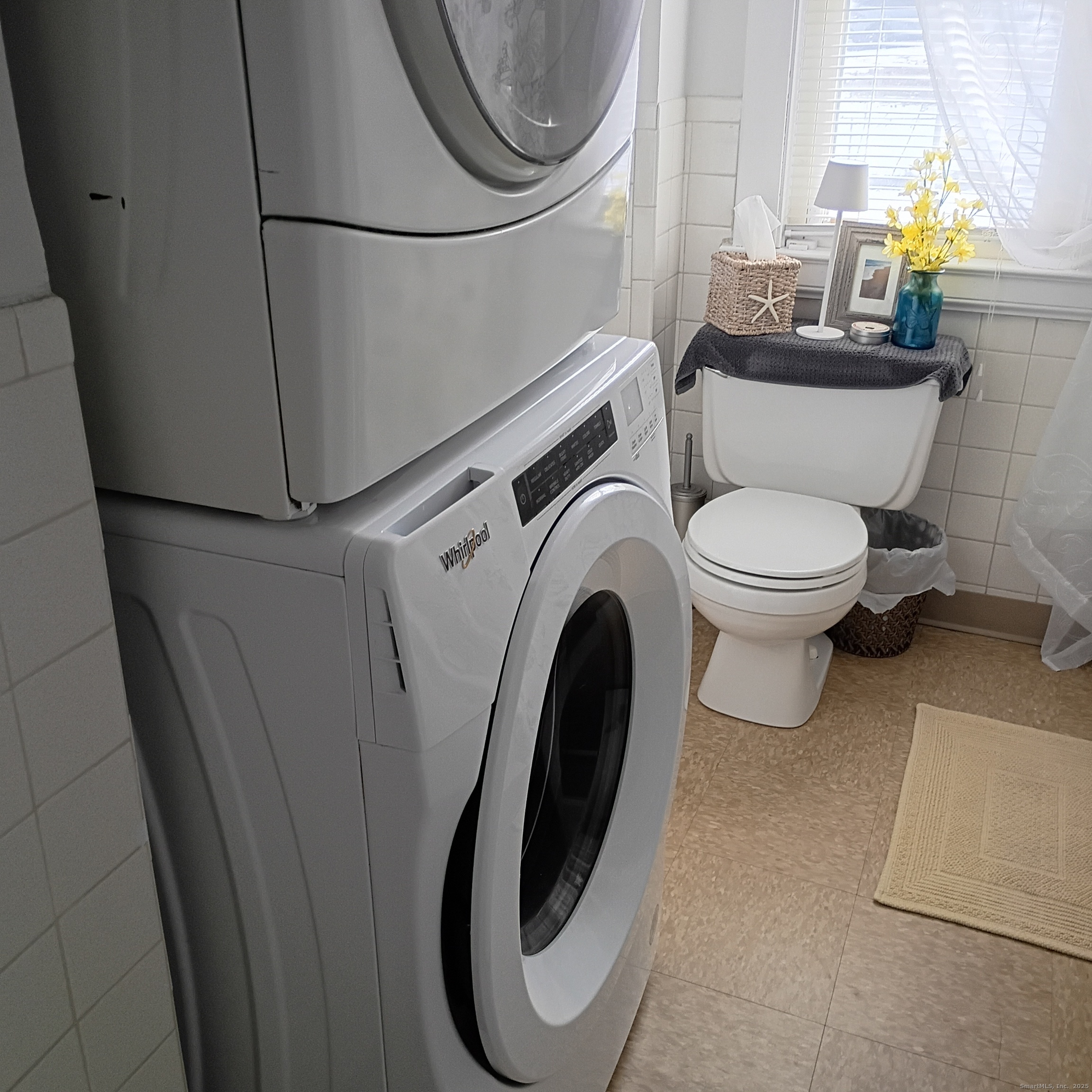 59 View Street, Unit 2 Bristol, CT 06010 - Photo 29 of 37 a bathroom with a toilet and a mirror