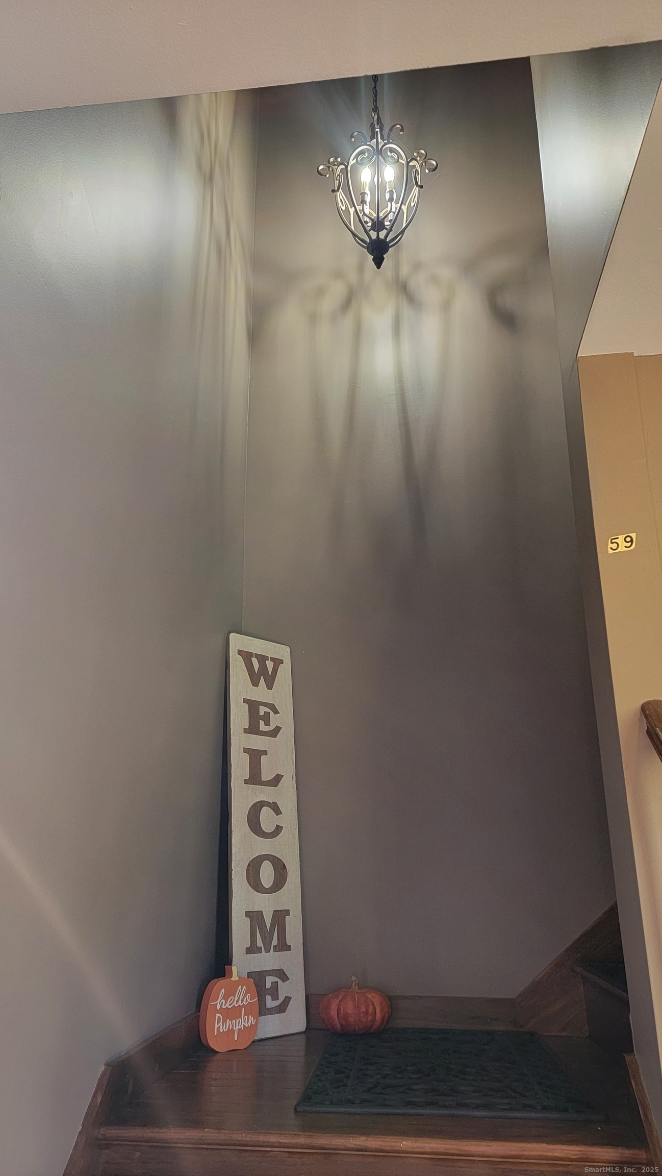 59 View Street, Unit 2 Bristol, CT 06010 - Photo 34 of 37 a view of an entryway with wooden floor