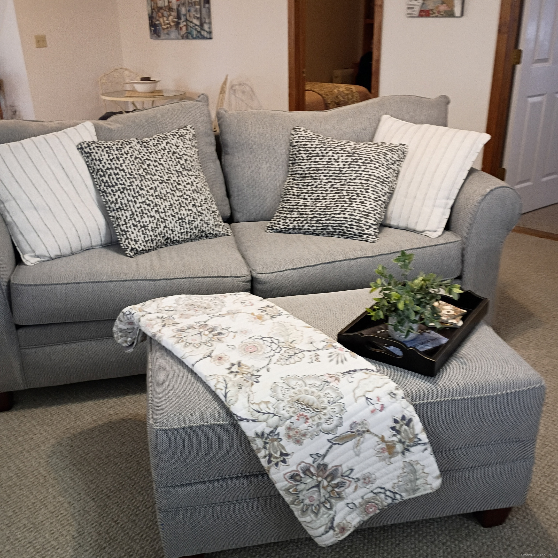 59 View Street, Unit 2 Bristol, CT 06010 - Photo 6 of 37 a living room with furniture and a couch