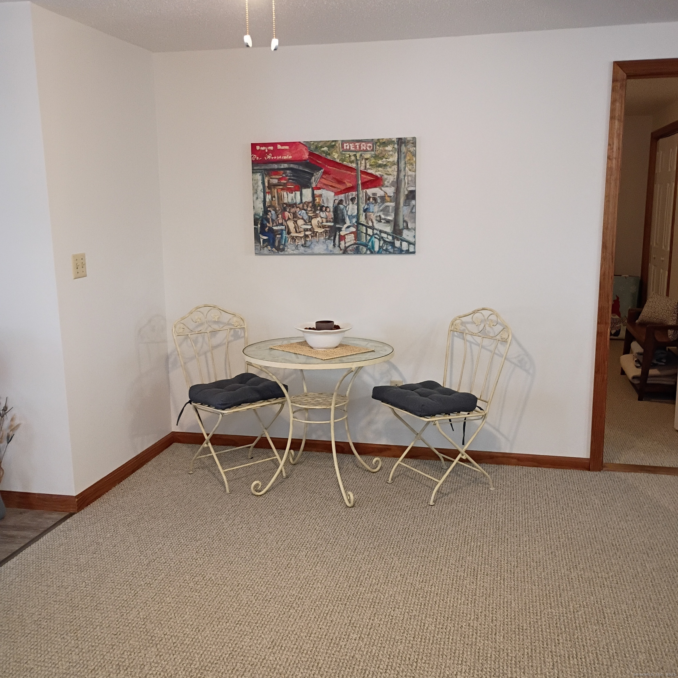59 View Street, Unit 2 Bristol, CT 06010 - Photo 9 of 37 a dining room with furniture and a flat screen tv