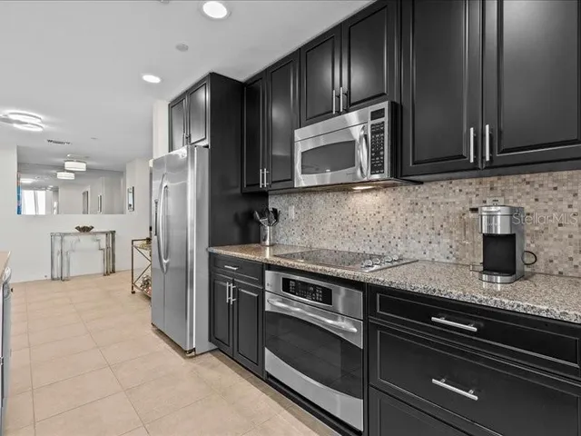 a bathroom with a double vanity sink mirror and double