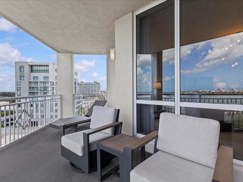 331 Cleveland Street, Unit 806 Clearwater, FL 33755 - Photo 36 of 83 a living room with furniture and a large window