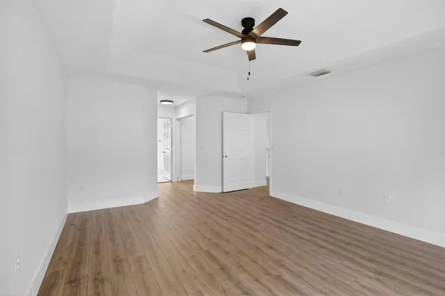 a bathroom with a double vanity sink mirror and shower