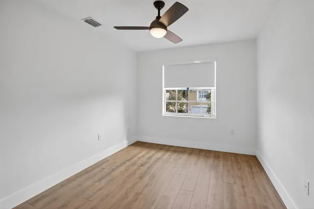 a front view of a house with yard