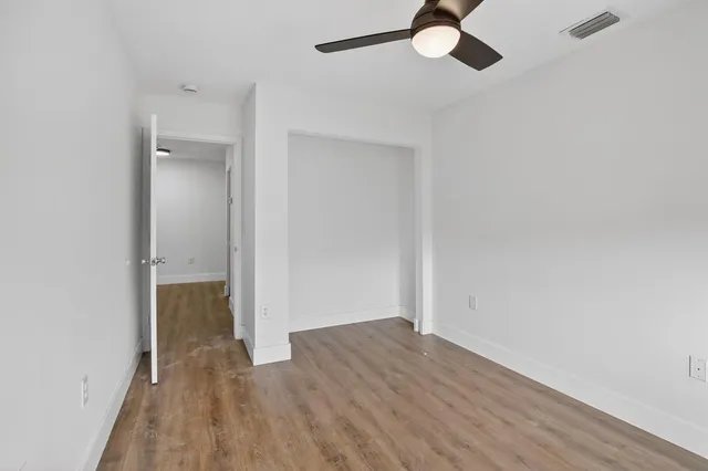 a view of a house with swimming pool and porch
