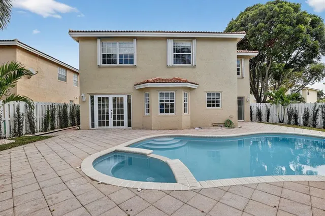 a view of outdoor space yard and swimming pool