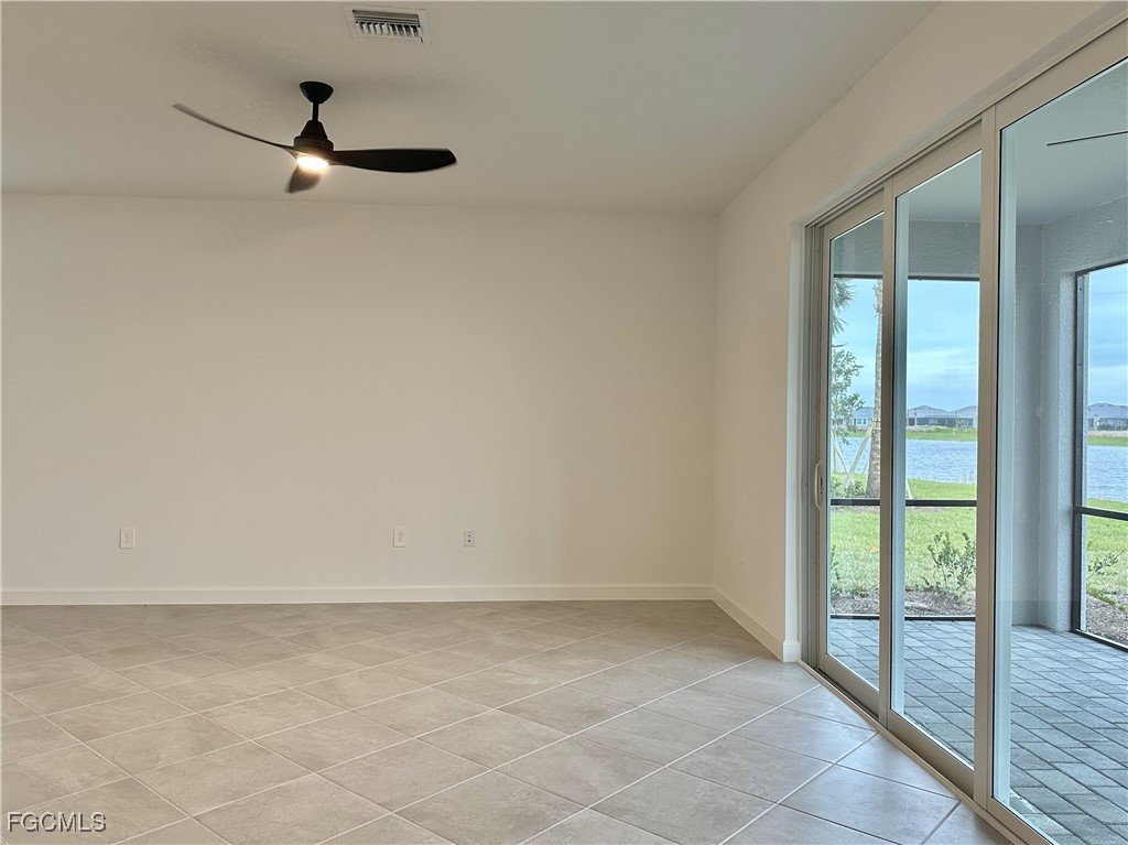 15084 Anchorage Road Punta Gorda, FL 33982 - Photo 11 of 30 a view of an empty room with glass door