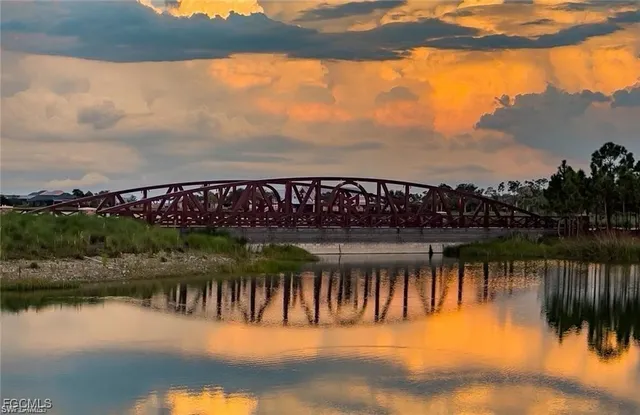 a view of a street with a ocean view