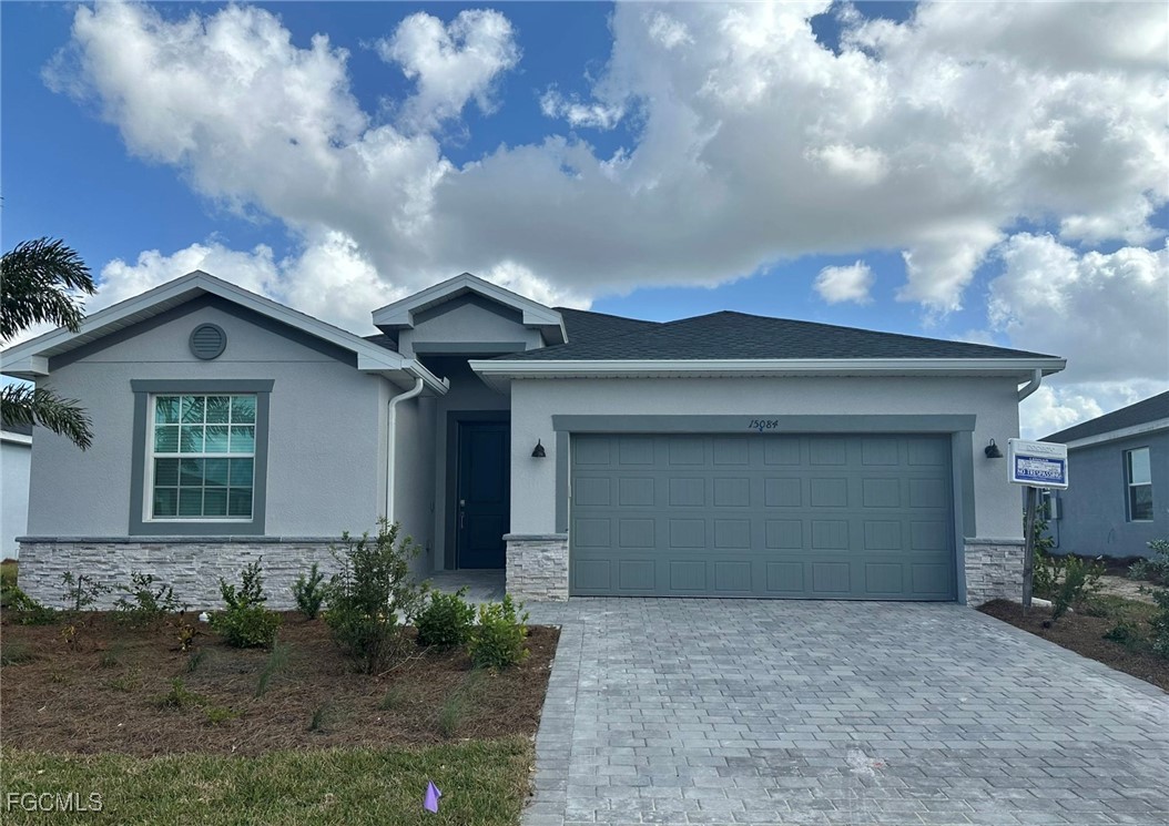 15084 Anchorage Road Punta Gorda, FL 33982 - Photo 3 of 30 a front view of a house with garden