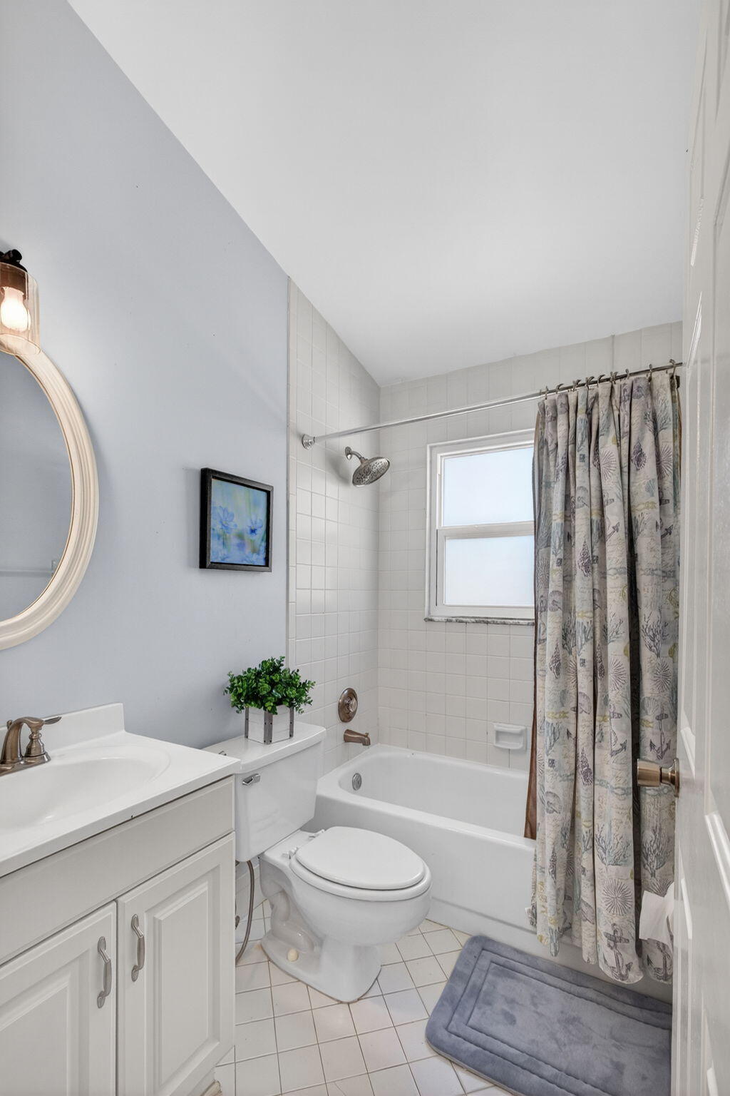 6223 Kendrick Street Jupiter, FL 33458 - Photo 14 of 45 a bathroom with a sink a toilet and shower