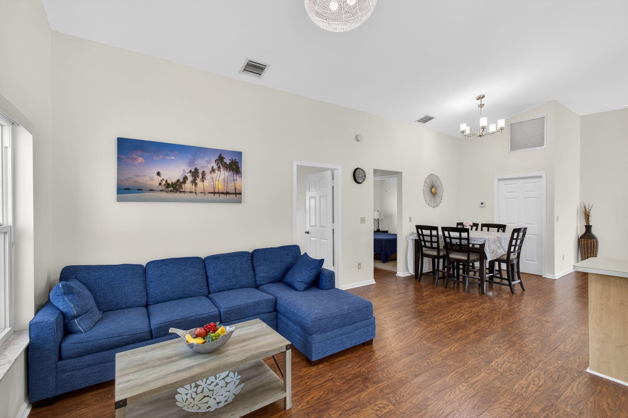 6223 Kendrick Street Jupiter, FL 33458 - Photo 2 of 45 a living room with furniture wooden floor and dining table