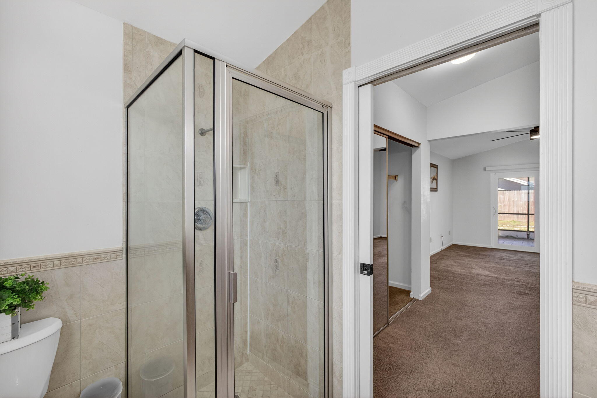 6223 Kendrick Street Jupiter, FL 33458 - Photo 26 of 45 a bathroom with a shower and a toilet