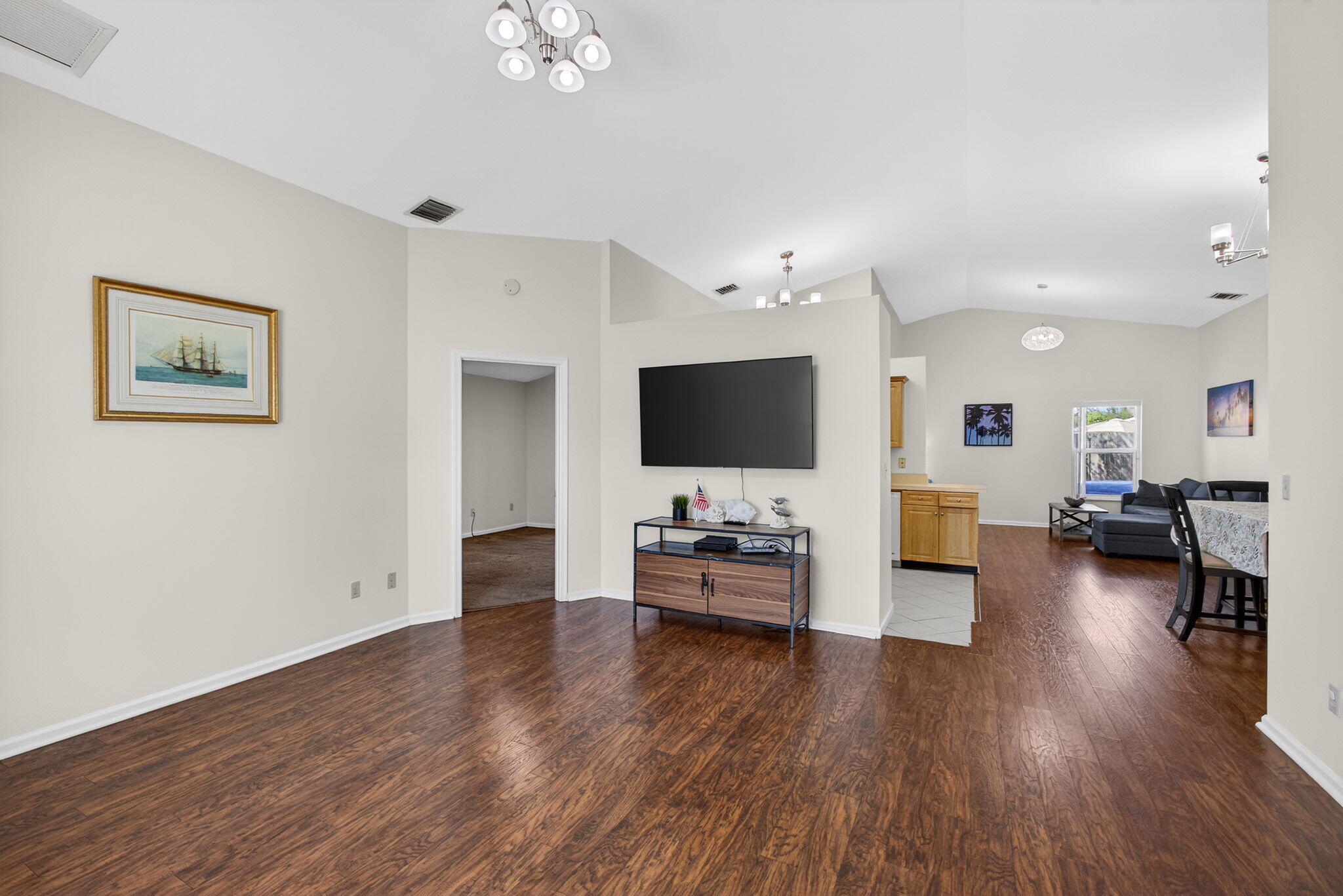 6223 Kendrick Street Jupiter, FL 33458 - Photo 3 of 45 a room with furniture and a flat screen tv