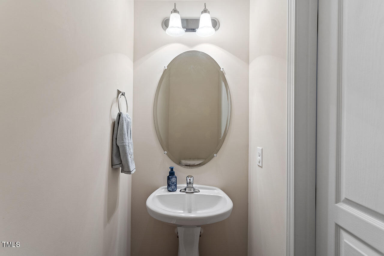 864 Cupola Drive Raleigh, NC 27603 - Photo 11 of 26 Half bath 1st floor