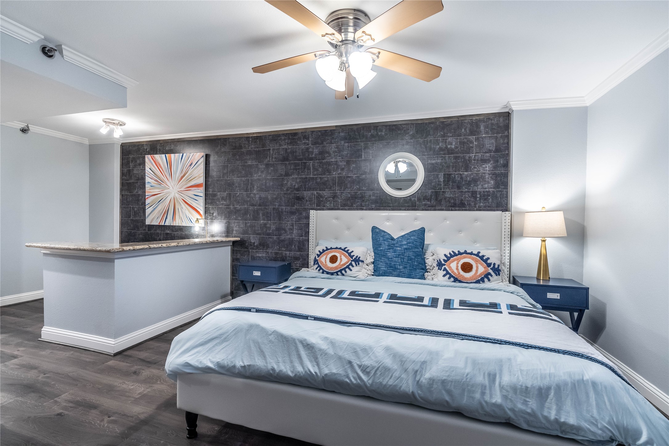 3525 Sage Road, Unit 1511 Houston, TX 77056 - Photo 11 of 25 a bedroom with a bed and a chandelier