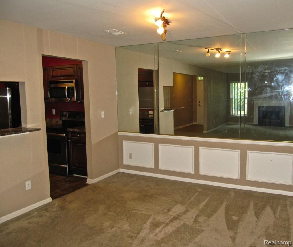 3397 Tremonte Circle, Unit 202 Rochester, MI 48306 - Photo 20 of 35 Dining Room overlooks Kitchen and Great Room