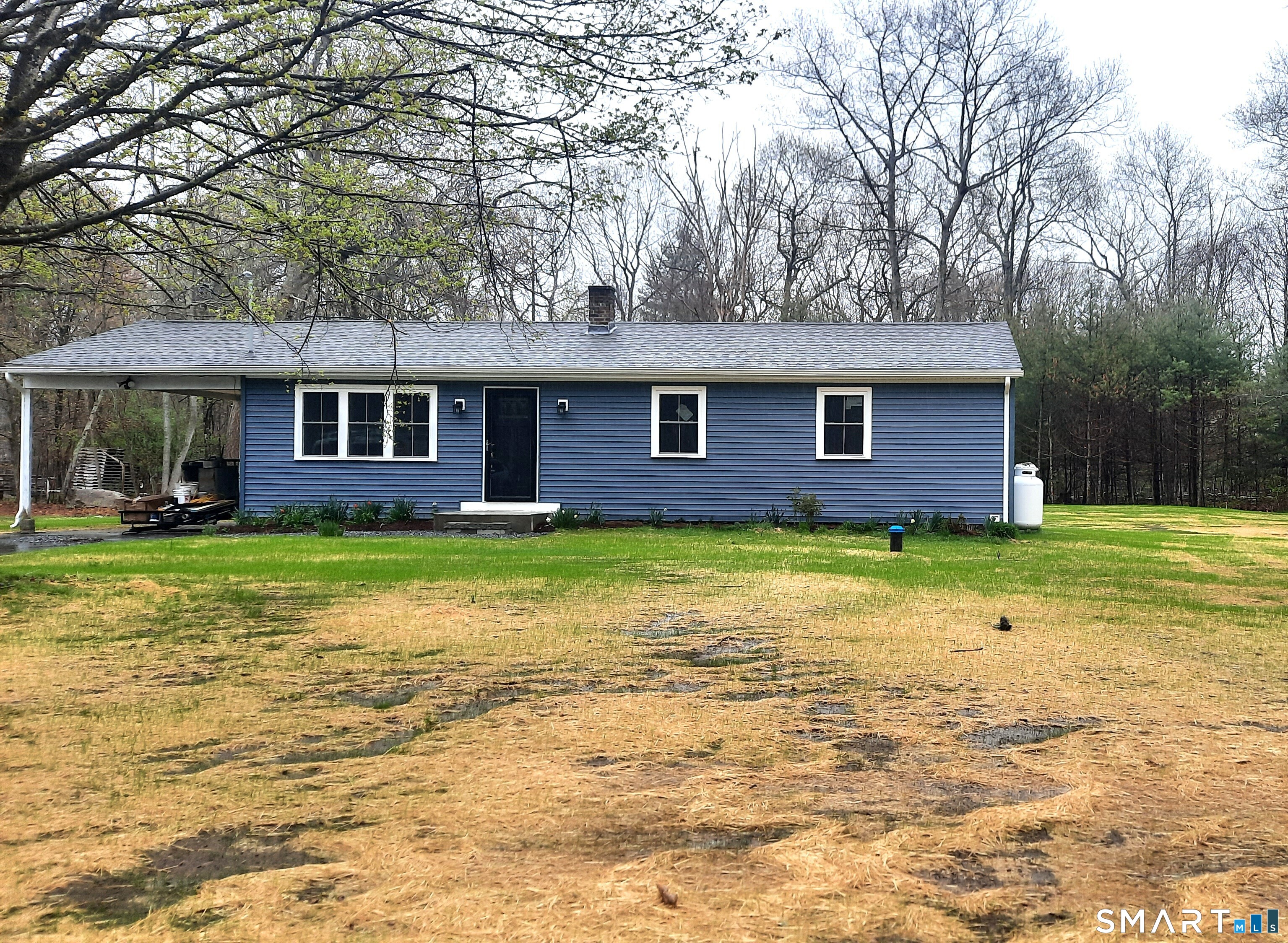 288 Margaret Henry Road Killingly, CT 06239 - Photo 1 of 1 a front view of a house with garden