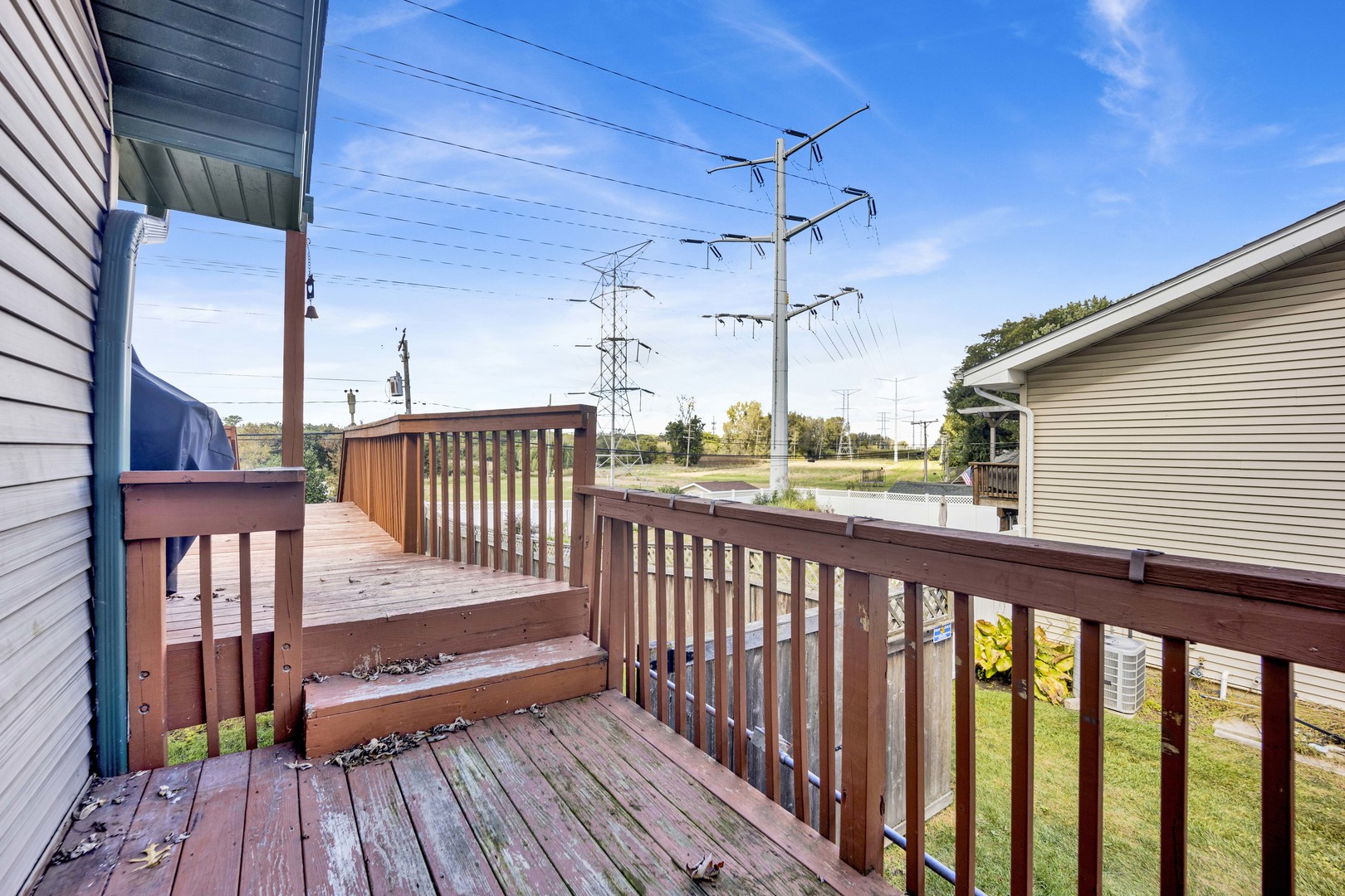 2S224 Valley Road Lombard, IL 60148 - Photo 13 of 37 a view of a balcony with wooden floor