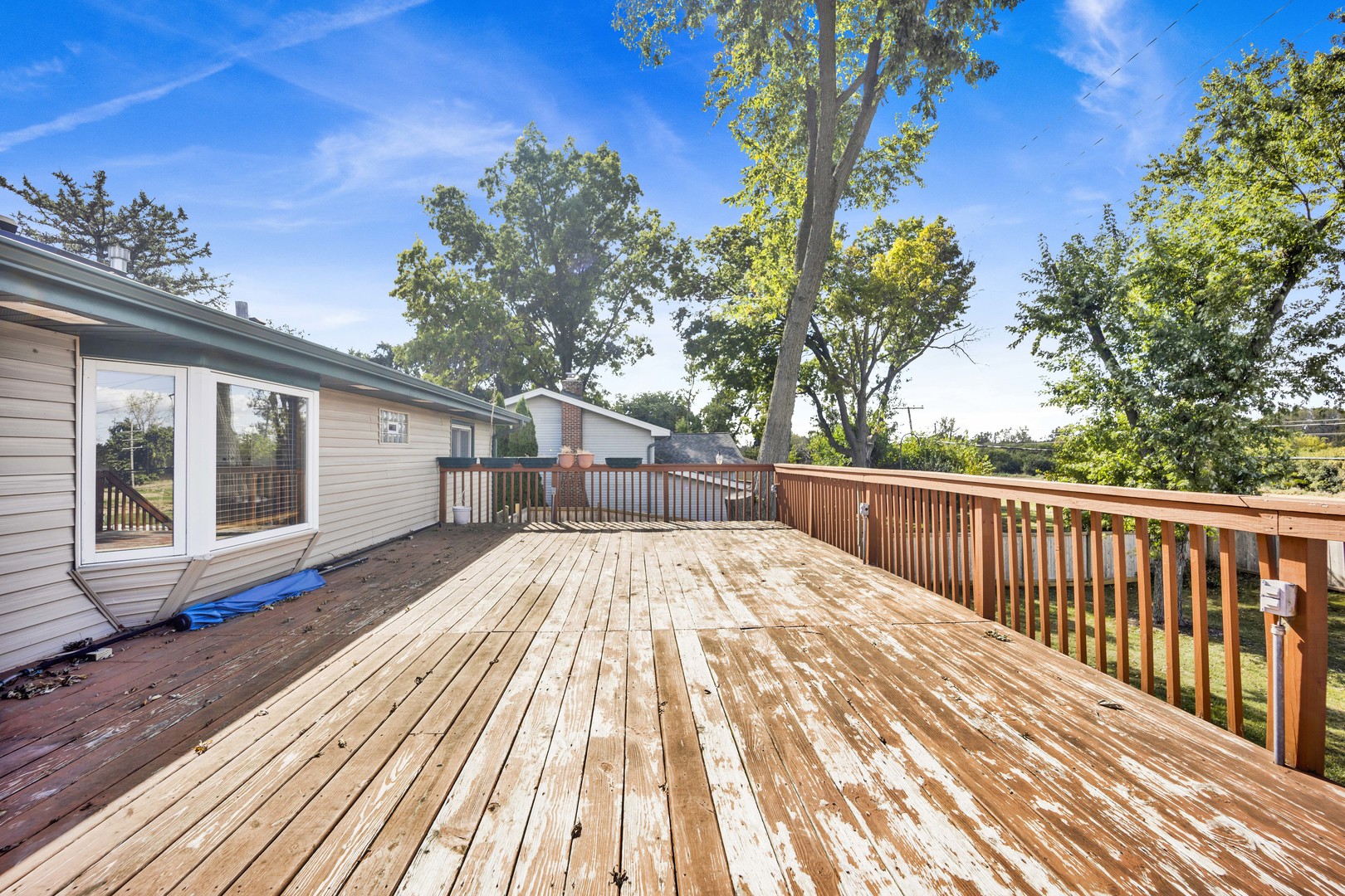 2S224 Valley Road Lombard, IL 60148 - Photo 15 of 37 a view of backyard with a deck and wooden floor