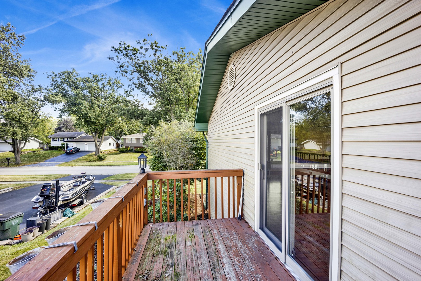 2S224 Valley Road Lombard, IL 60148 - Photo 18 of 37 a view of a balcony with wooden floor