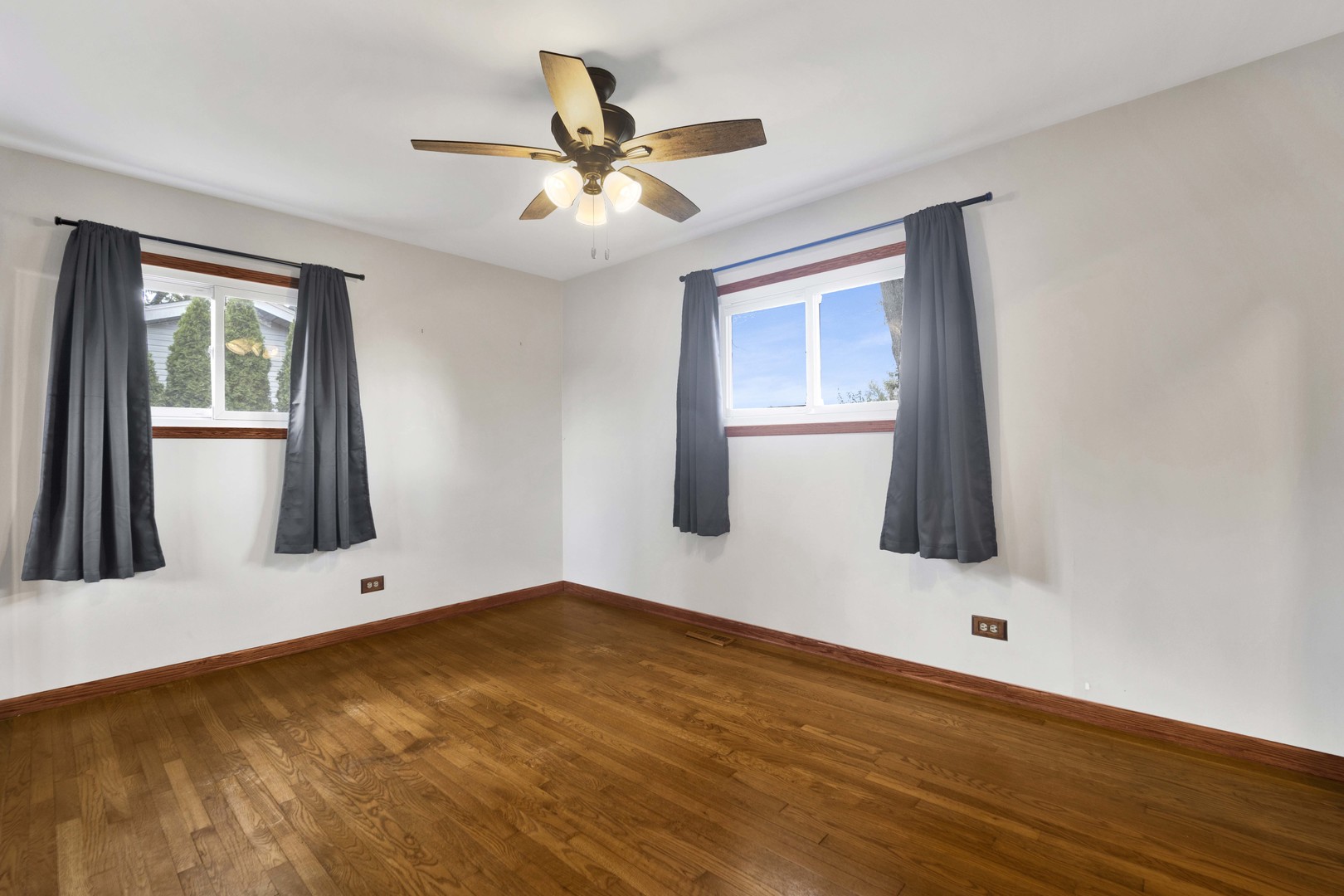2S224 Valley Road Lombard, IL 60148 - Photo 19 of 37 a view of an empty room with wooden floor and a window
