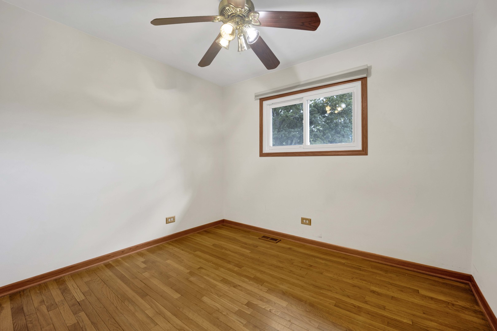 2S224 Valley Road Lombard, IL 60148 - Photo 22 of 37 a view of empty room with wooden floor